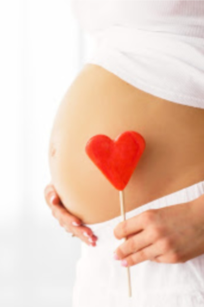 image of pregnant belly with a heart