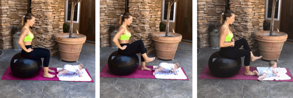 mom on exercise ball wearing a green sports bra doing seated marches to strengthen her core after pregnancy