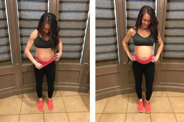 fit pregnant mom using kinesiology tape to support her belly and back pain