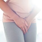 women crossing her legs because of pubis symphysis pain