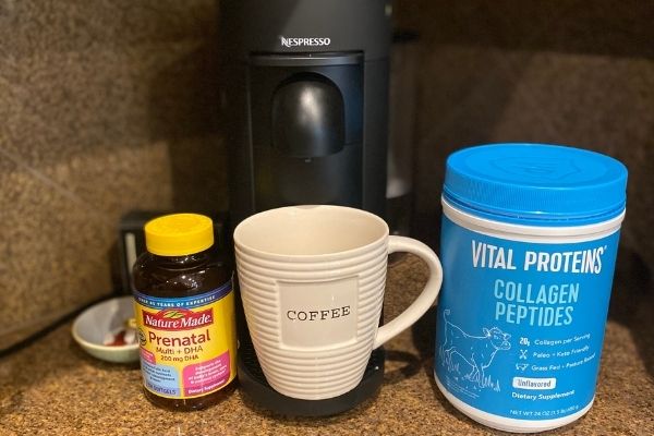 a coffee cup in a coffee maker with collagen protein and prenatal vitamins