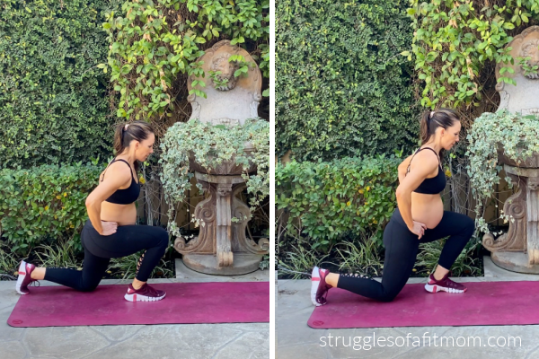 Fit pregnant mom in her third trimester doing a reverse lunge exercise. She is wearing a black pants and a black sports bra. She is on a pink yoga mat outside.  